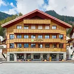 Am Dorfplatz Апарт-отель Адельбоден